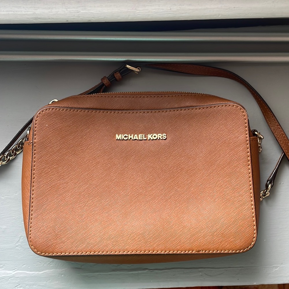 Tan Michael Kors crossbody with details